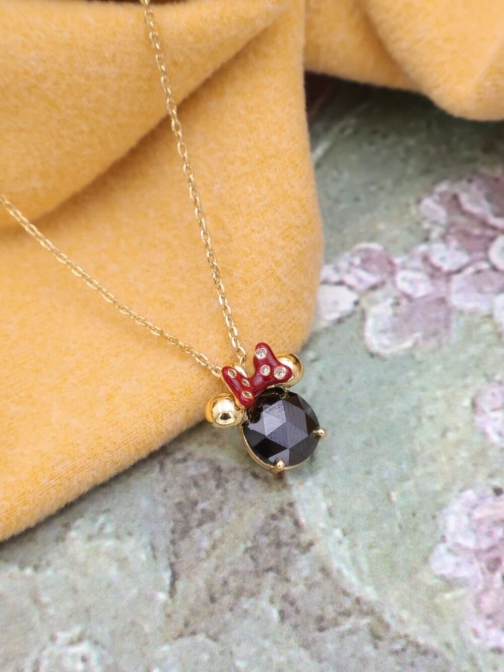 kate spade Gold Necklace with Black Stone and Red Bow Pendant